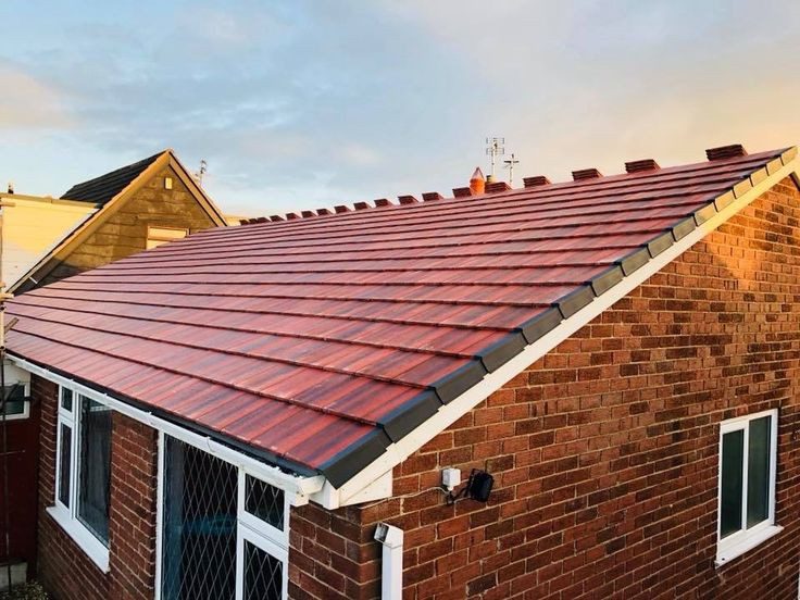 2022-11-07 Men Repairing The Roof