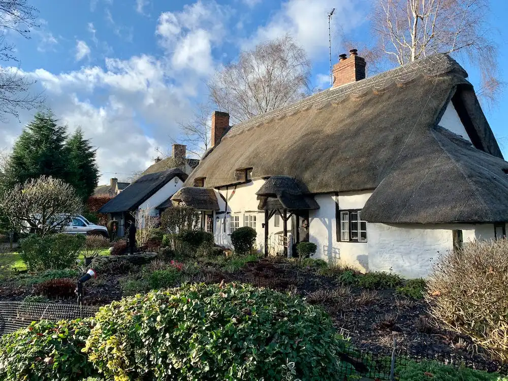OPT – pexels-photo-6255053 Traditional House with Thatched Roof - Cambridge Roofing Repairs